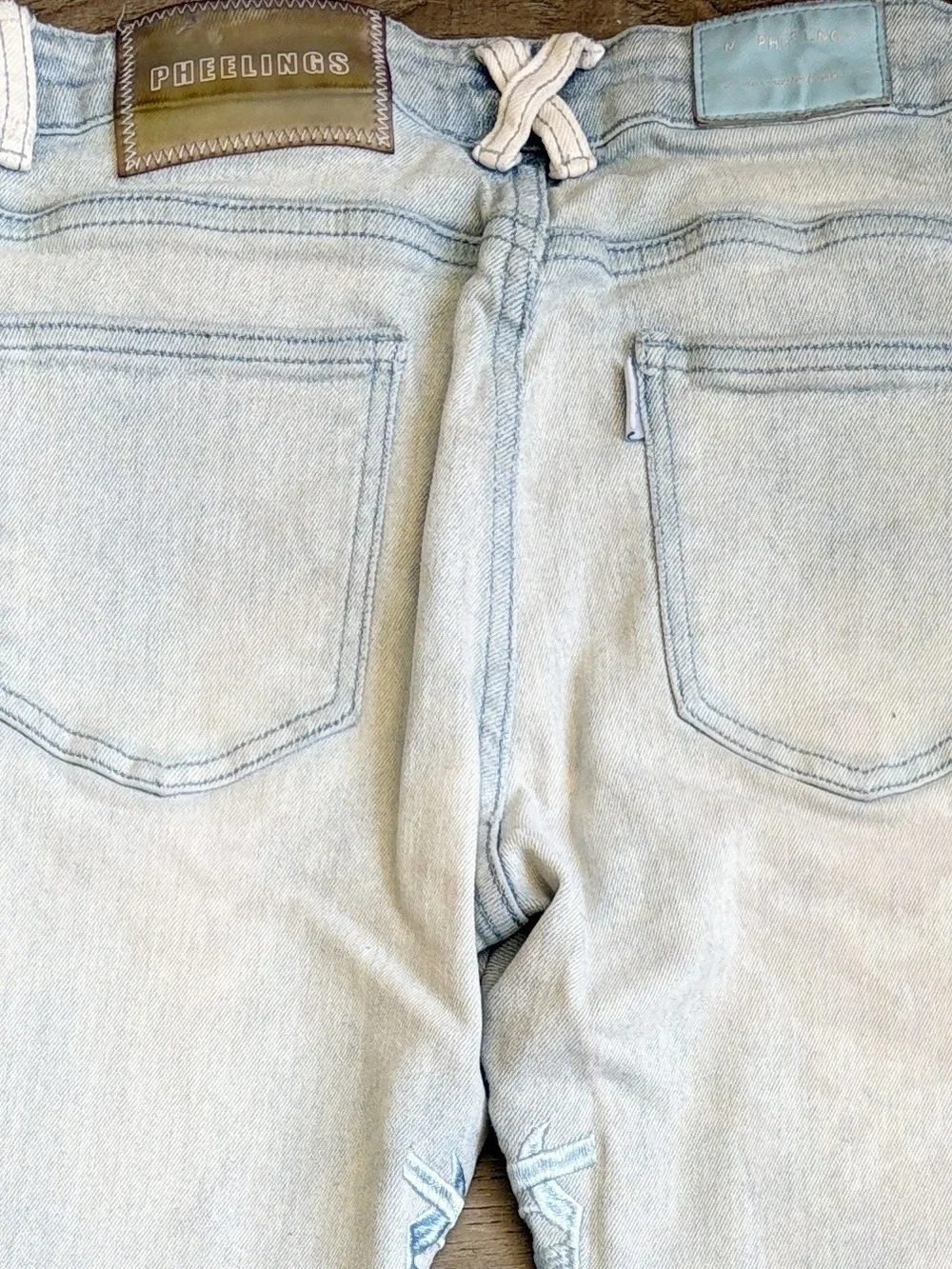 Pheelings Against All Odds Light Wash Embroidered Detail Stacked Slim Leg Jeans